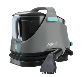 Gray and black Achaté handheld steam cleaner with a flexible hose and a brush attachment designed for chemical-free, deep cleaning on multiple surfaces.