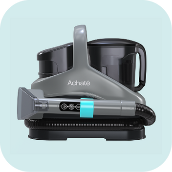 Compact gray handheld steam cleaner with a flexible hose, ergonomic handle, and water tank, designed for chemical-free deep cleaning.