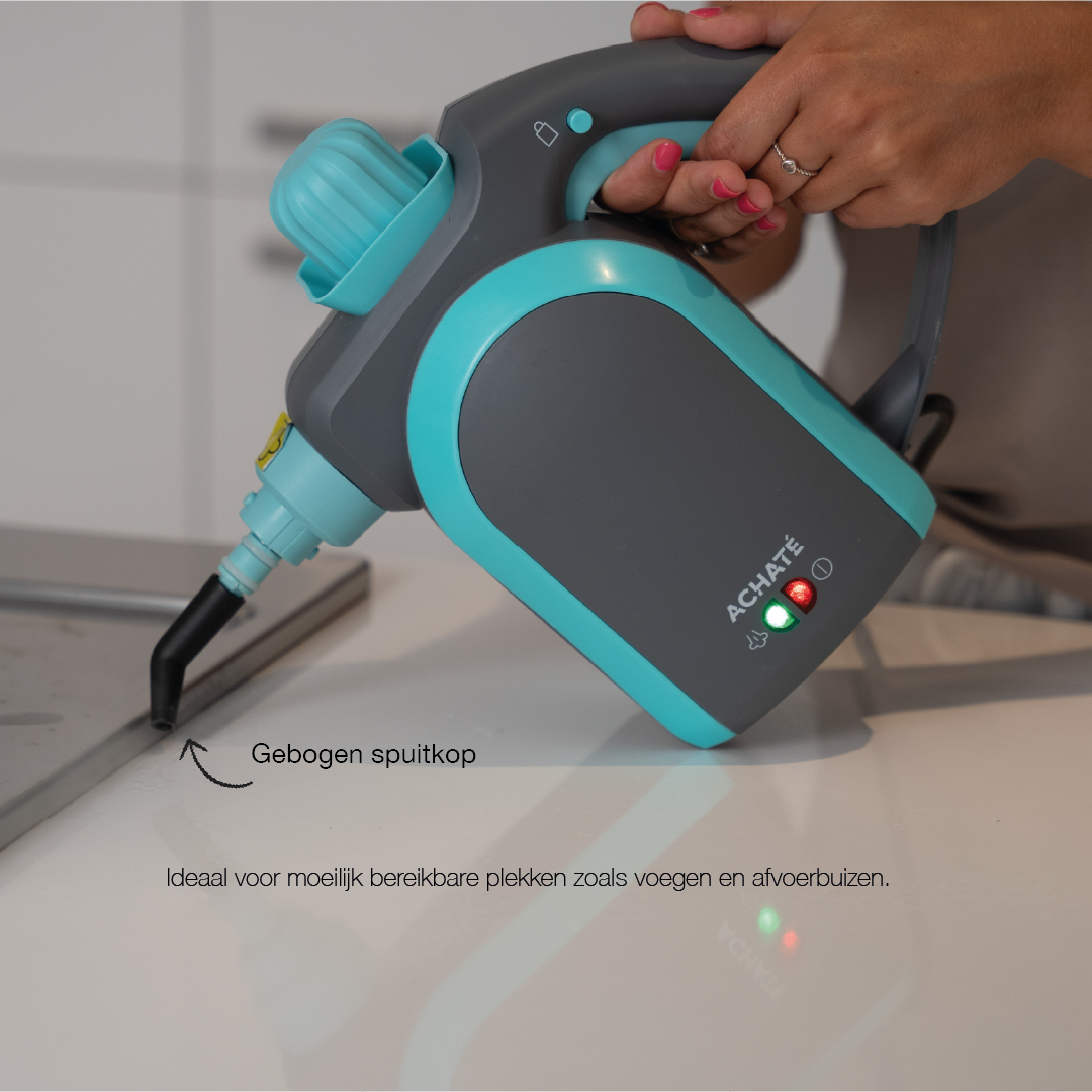 Handheld steam cleaner with a curved nozzle attachment being used to clean a narrow edge on a countertop for deep chemical-free cleaning.