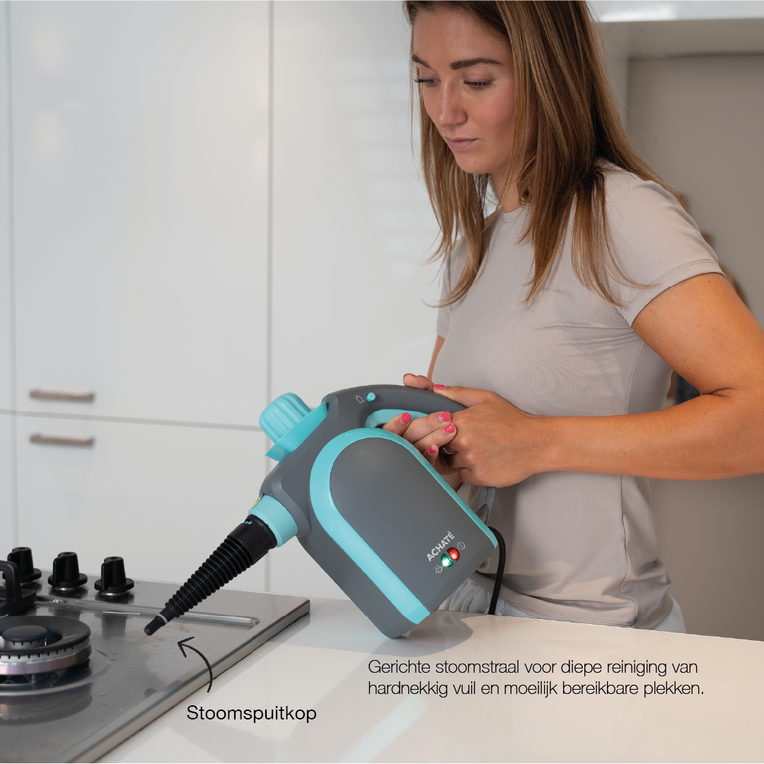 Woman using a handheld steam cleaner with a narrow nozzle attachment to deep clean a stovetop in a kitchen setting