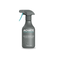 Gray spray bottle labeled Achaté odor remover with flower and lemon scent, featuring a trigger nozzle and minimalist design
